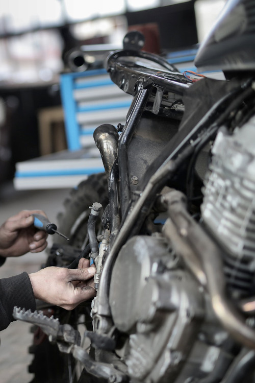 Motorcycle engine being serviced